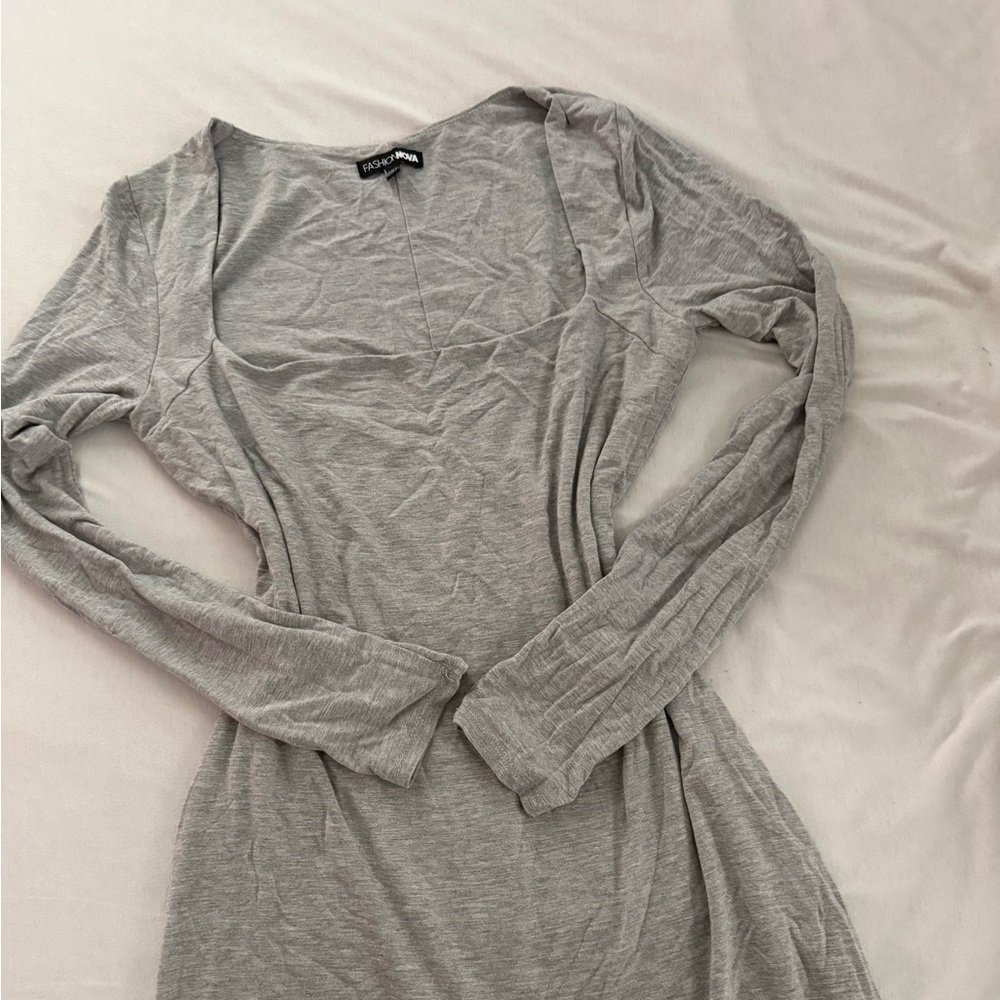 gray long sleeve romper from fashion nova 

size medium